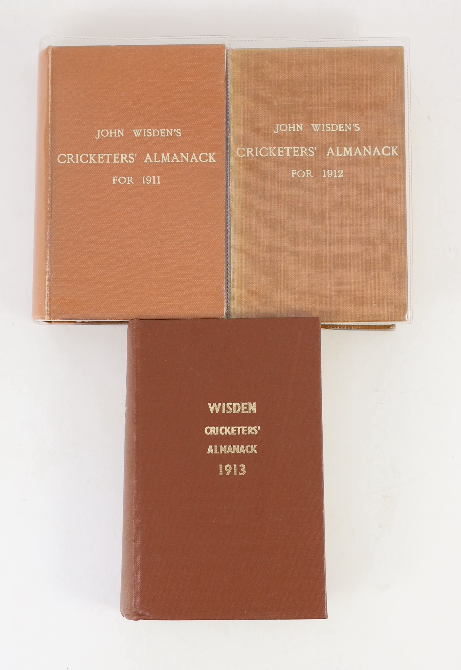 Wisden, John - Cricketers’ Almanack for the years 1907 (44th edition) - 1913 (Jubilee number), all rebound brown cloth gilt, and retaining original paper wrappers, bar issue of 1912, lower paper margin to front wrapper o